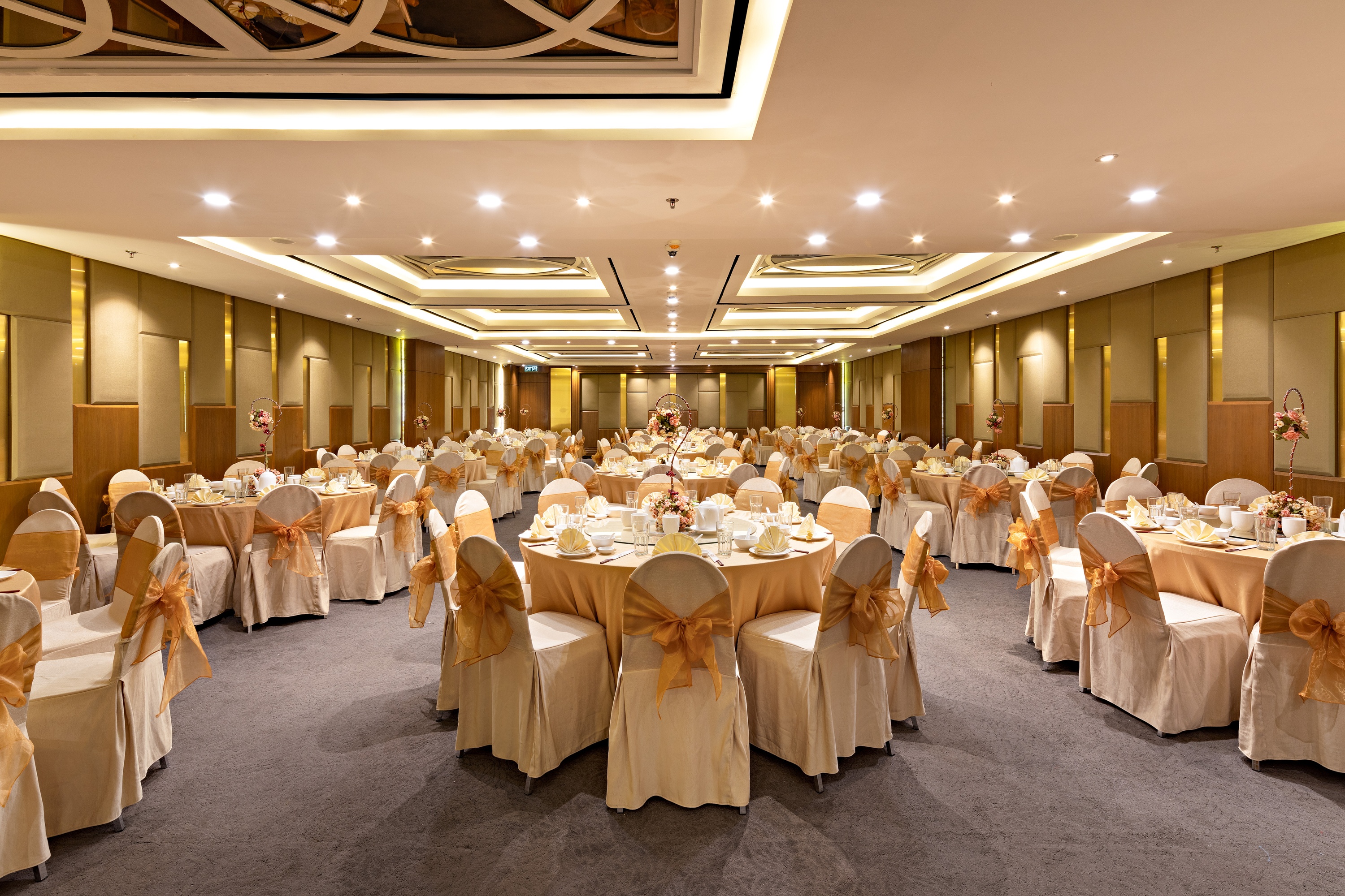 Elegant banquet hall with golden decorations