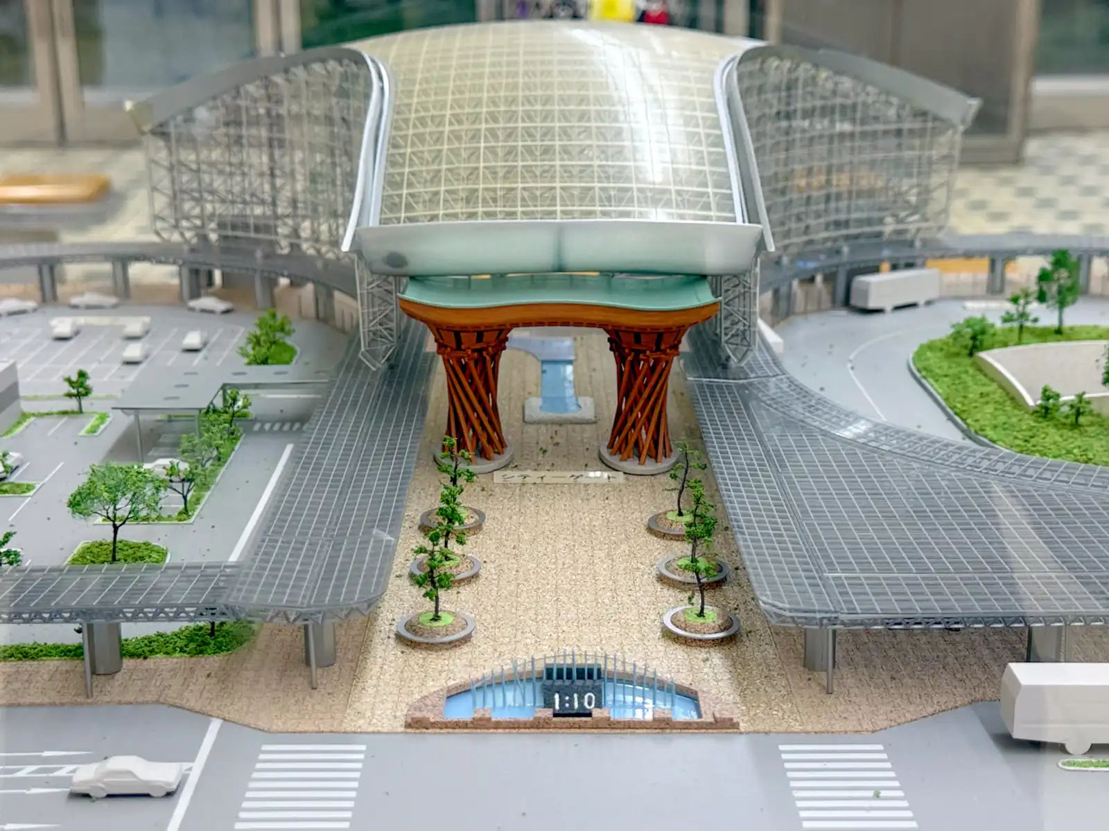A scale model of Kanazawa Station's east exit on display inside the station, showing the Tsuzumi Gate, the Motenashi Dome, the covered walkways and the water clock fountain.