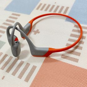 アフターショックス(AFTERSHOKZ)のSHOKZ OPENRUN PRO 骨伝導イヤホン オレンジ キプチョゲモデル(ヘッドフォン/イヤフォン)