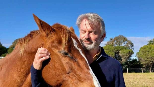 Sam Neill hanging out with his horse on his Queenstown Farm. Photo / @TwoPaddocks Twitter