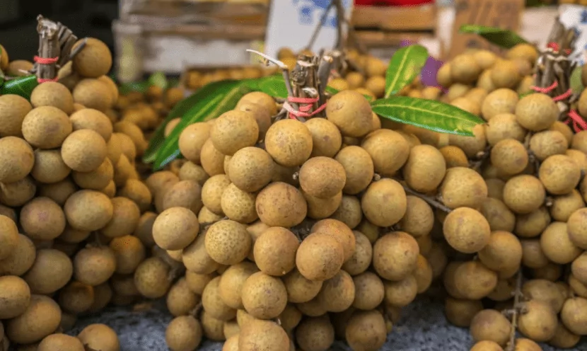 Longans on the counter in the market in Vietnam Longans on the counter in the market in Vietnam