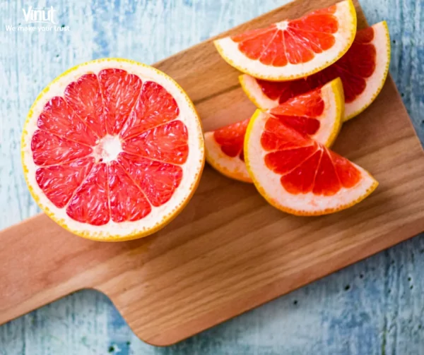 VINUT_To enjoy a pomelo, start by removing the outer rind and then gently separate the segments VINUT_To enjoy a pomelo, start by removing the outer rind and then gently separate the segments