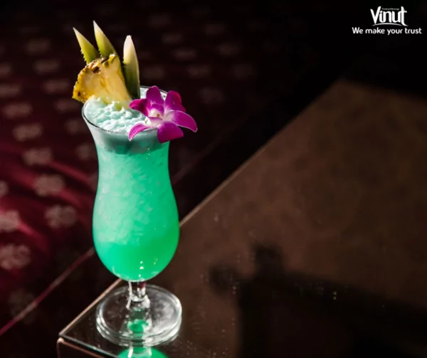 VINUT_ Tropical drink with a distinctive vibrant blue color VINUT_ Tropical drink with a distinctive vibrant blue color